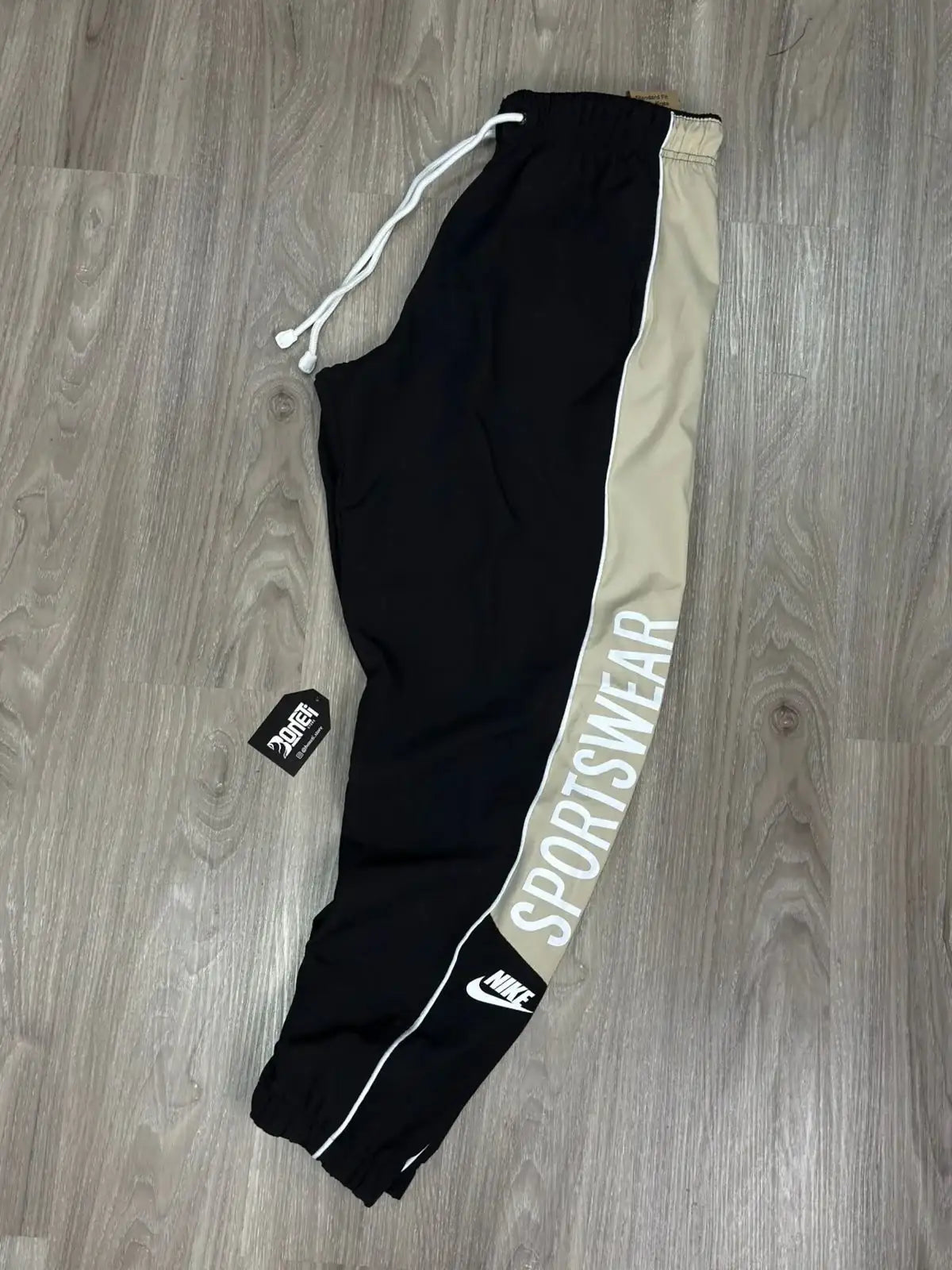 CALÇA WOVEN NK SPORTSWEAR - PRETA