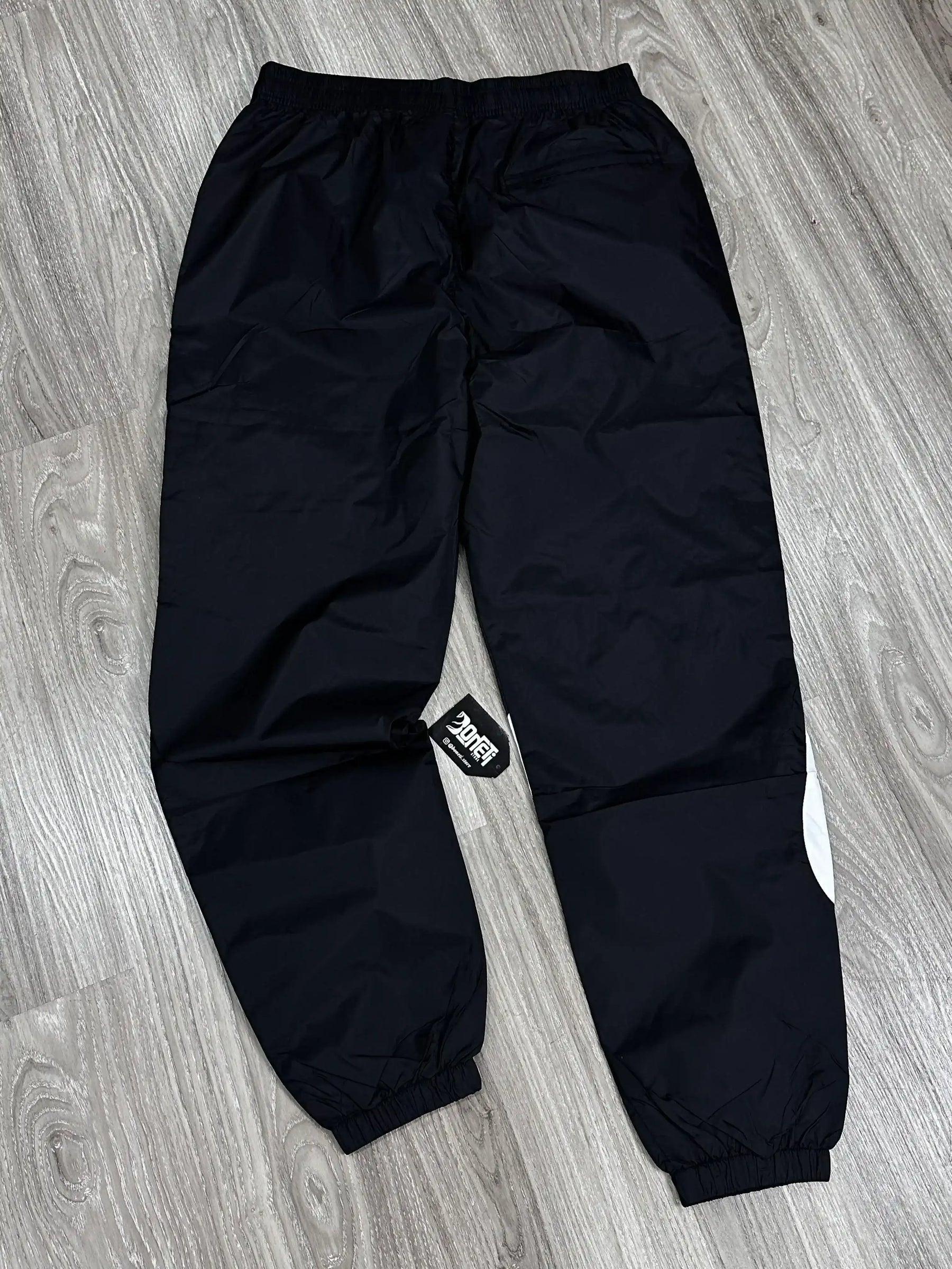 CALÇA NK TACTEL IMPERMEÁVEL BIG SWOOSH - PRETA