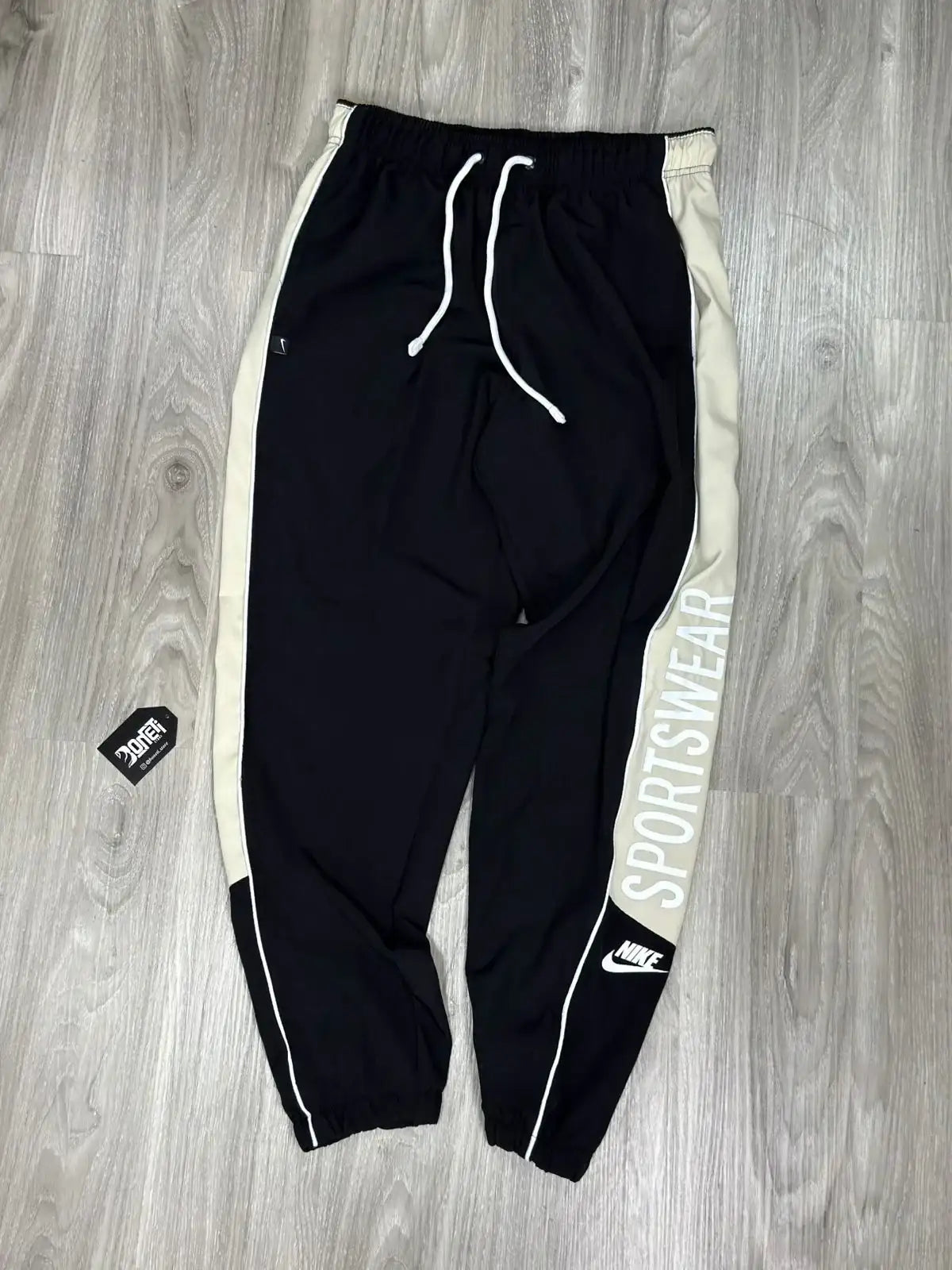 CALÇA WOVEN NK SPORTSWEAR - PRETA