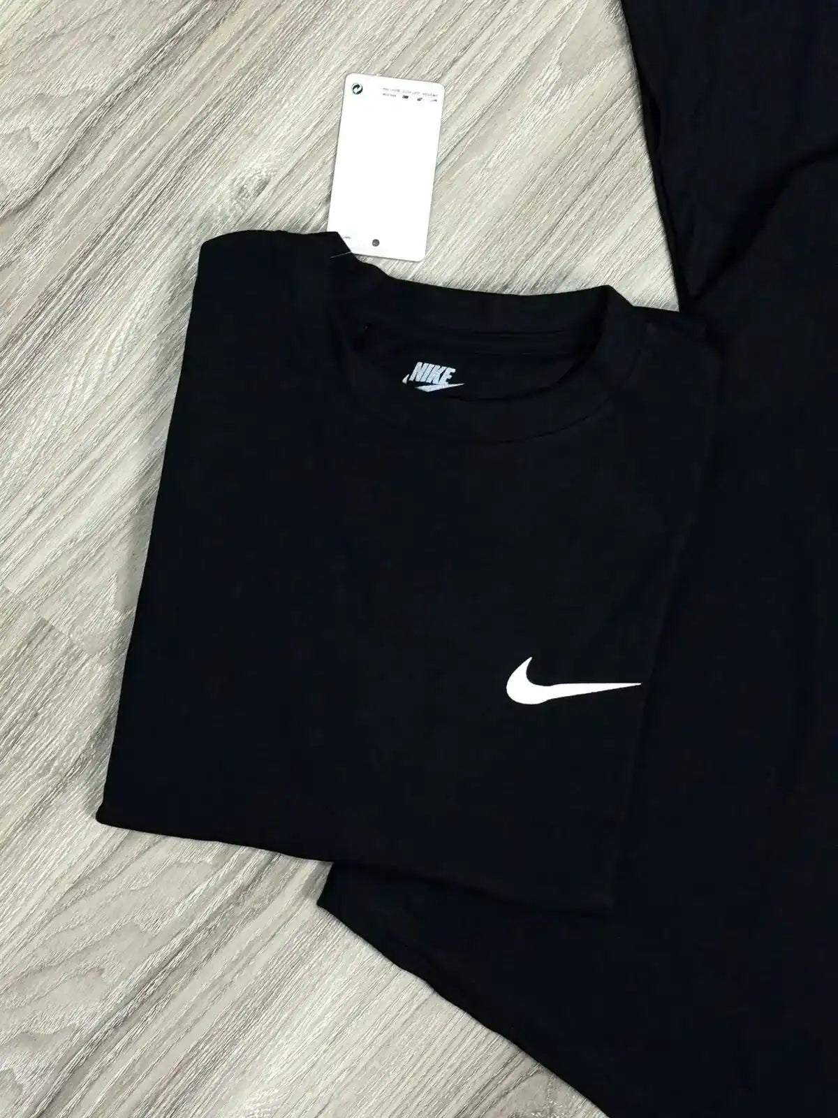 CAMISETA OVERSIZED NK X STUSSY - PRETA