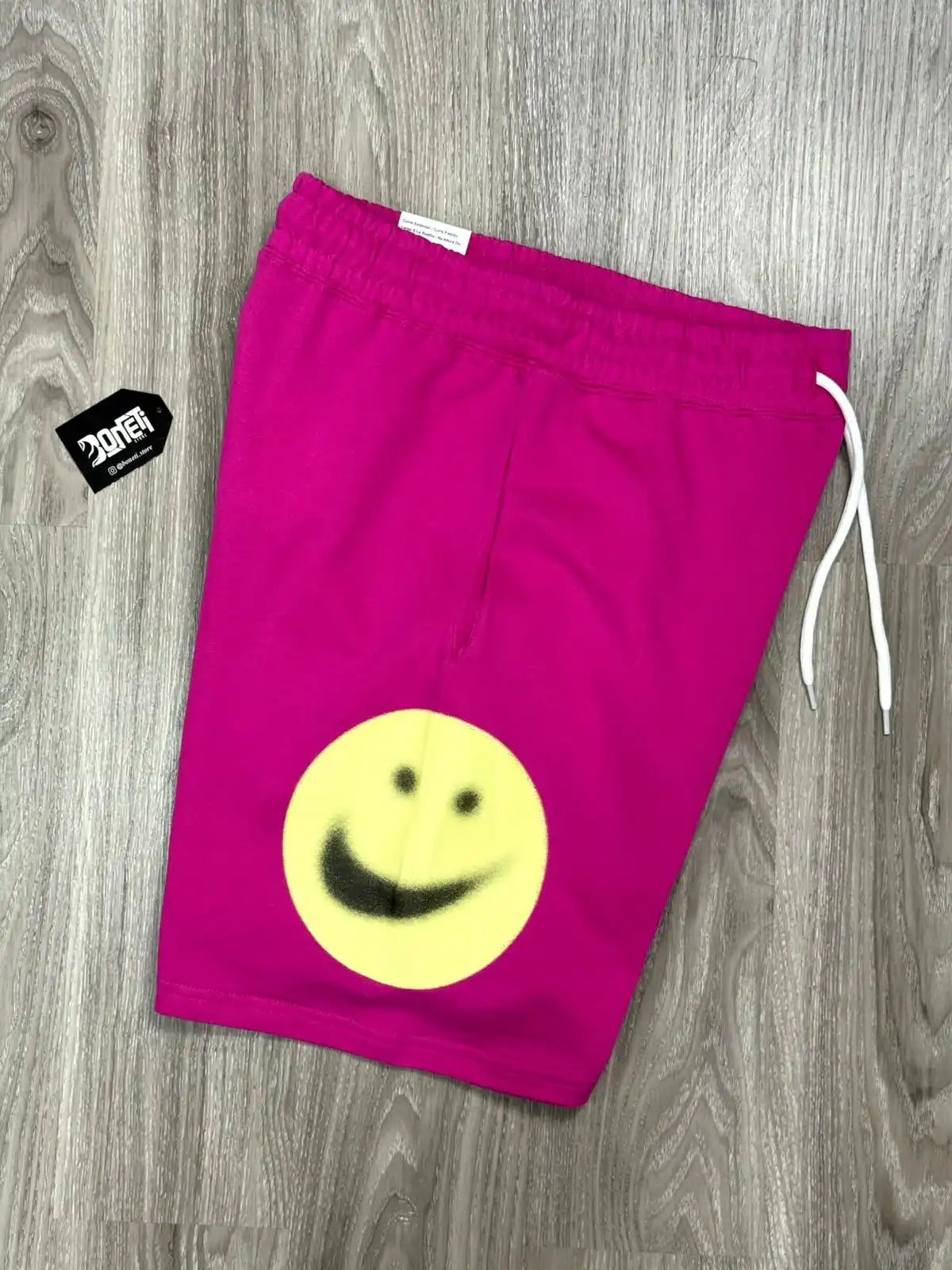 SHORTS MOLETOM NK WORLD TOUR - ROSA