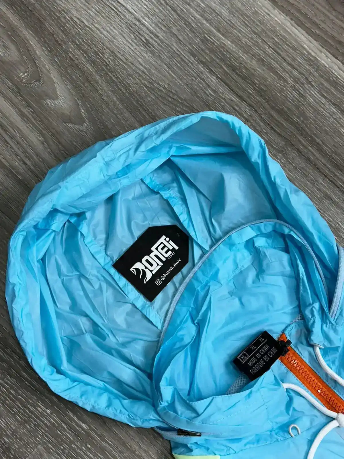 CORTA VENTO NK WINDRUNNER - AZUL E VERDE