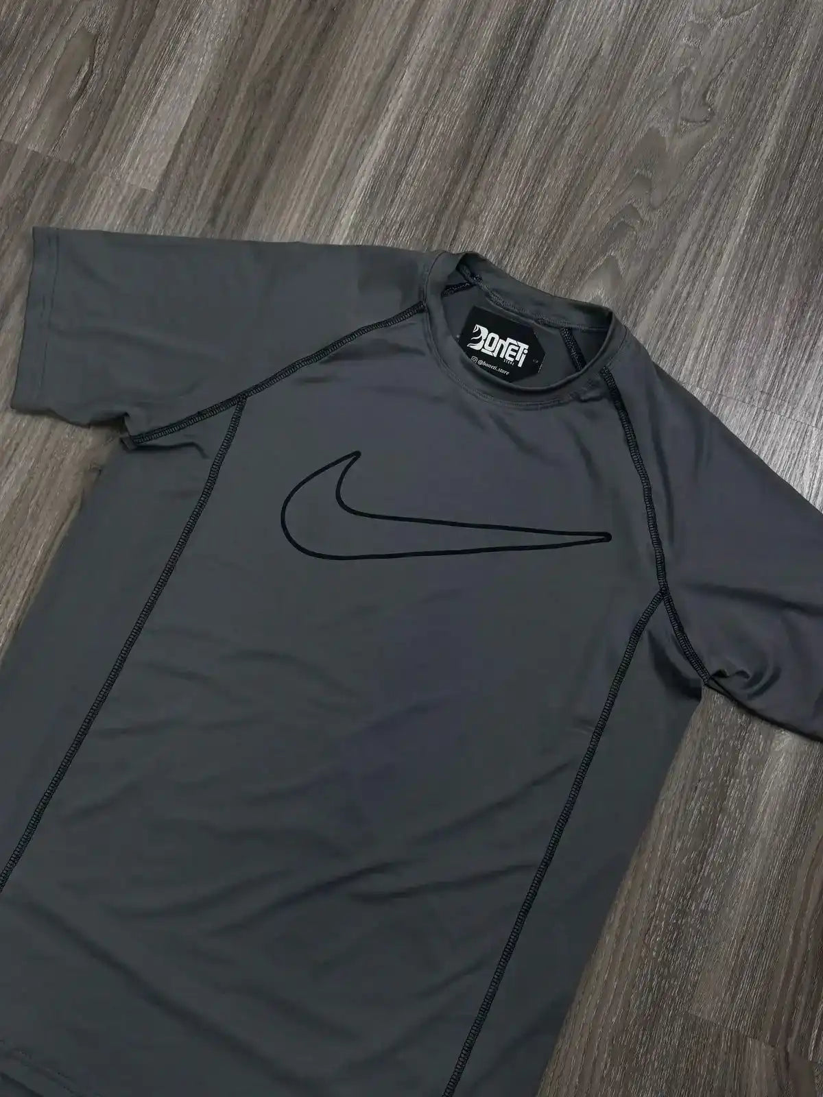 CAMISETA NK DRI-FIT SWOOSH VAZADO - CINZA