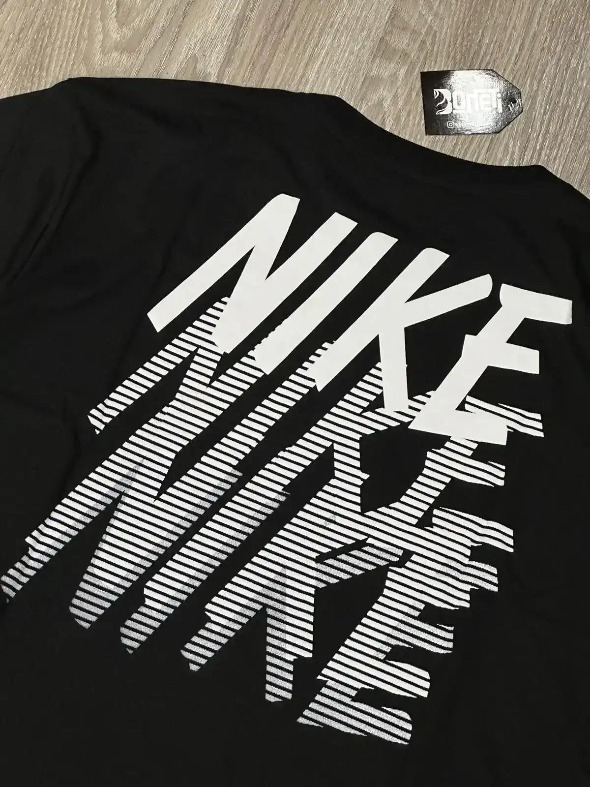 CAMISETA NK REPEAT FADE