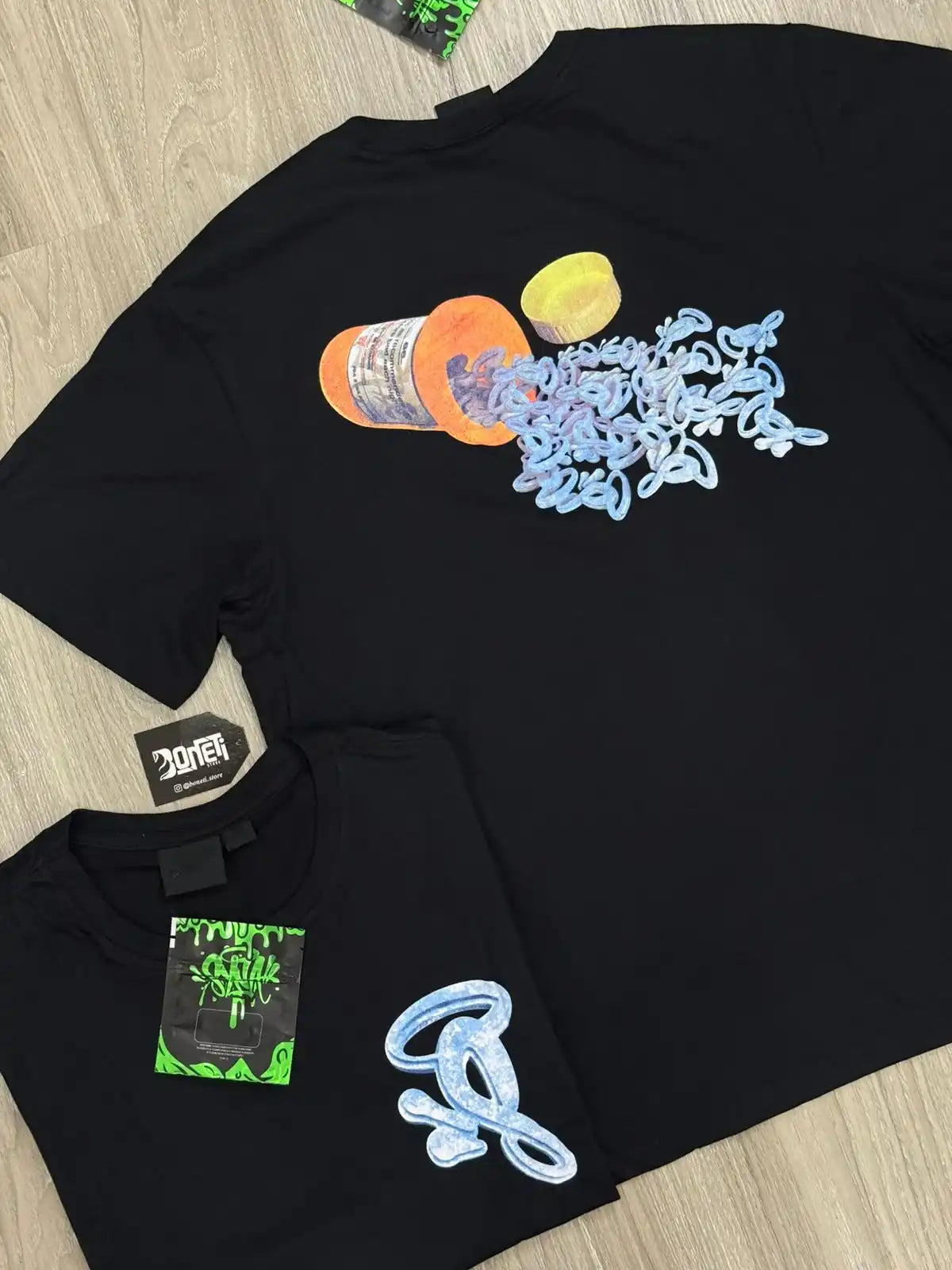 CAMISETA SYNA WORLD PILL - PRETA