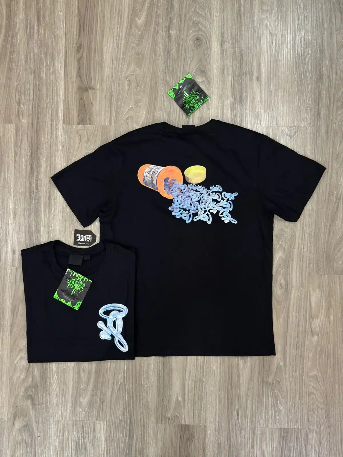 CAMISETA SYNA WORLD PILL - PRETA