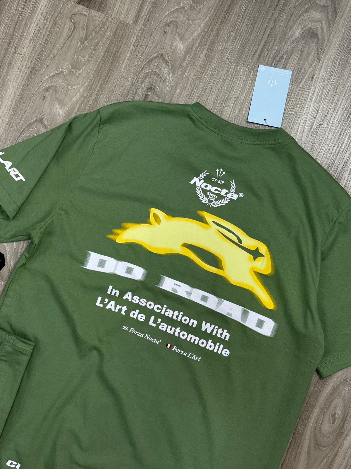 CAMISETA NK X NOCTA ROAD - VERDE MUSGO