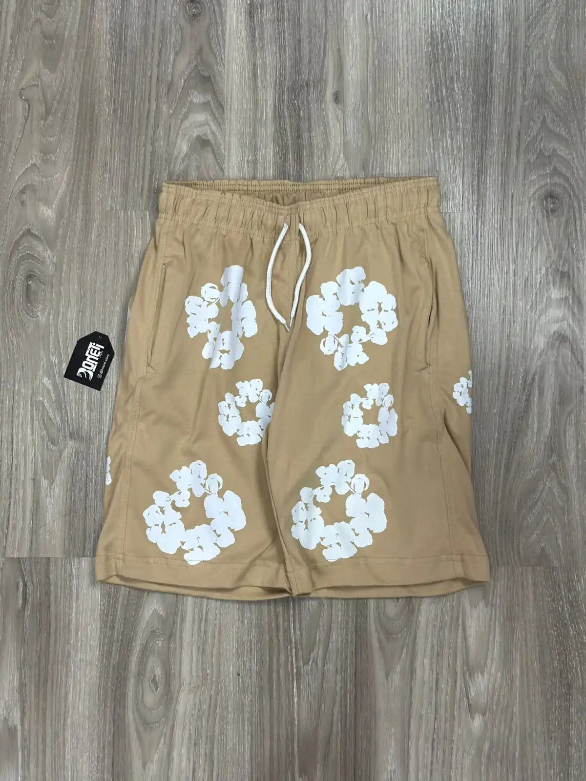 SHORTS MOLETOM DENIM TEARS - CAQUI