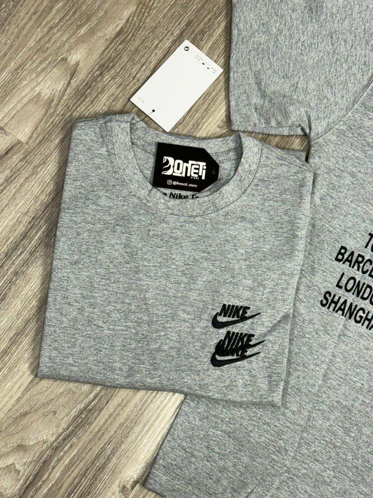 CAMISETA NK WORLD TOUR - CINZA