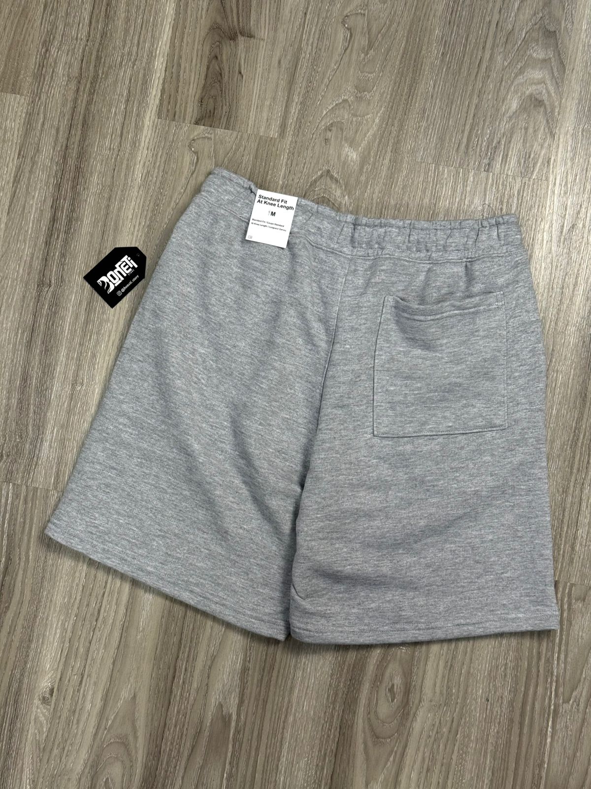 SHORTS MOLETOM NK SPORTSWEAR CLUB - CINZA