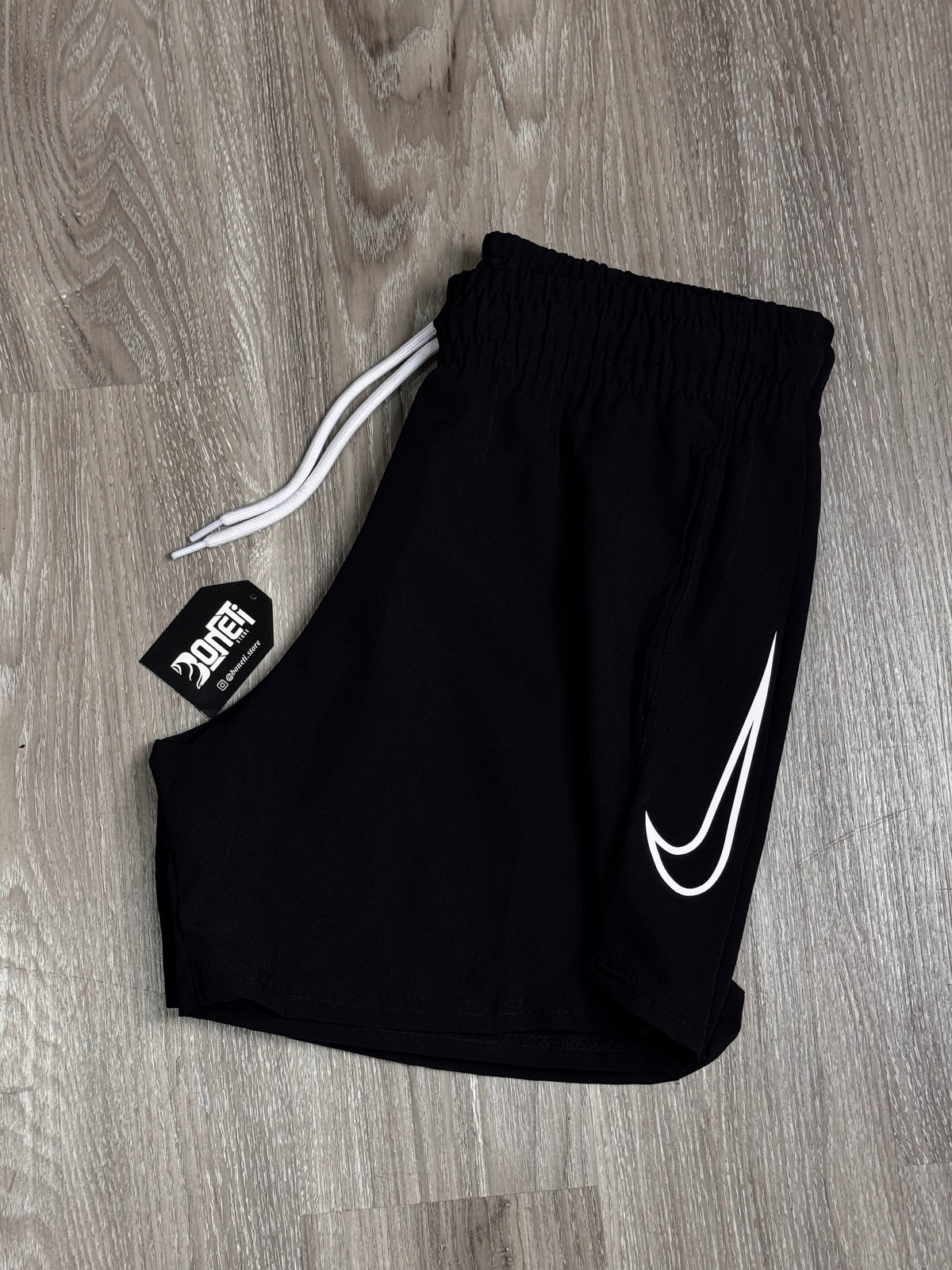 SHORTS TACTEL NK SWOOSH VAZADO VERTICAL - PRETO