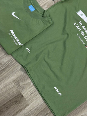 CAMISETA NK X NOCTA ROAD - VERDE MUSGO