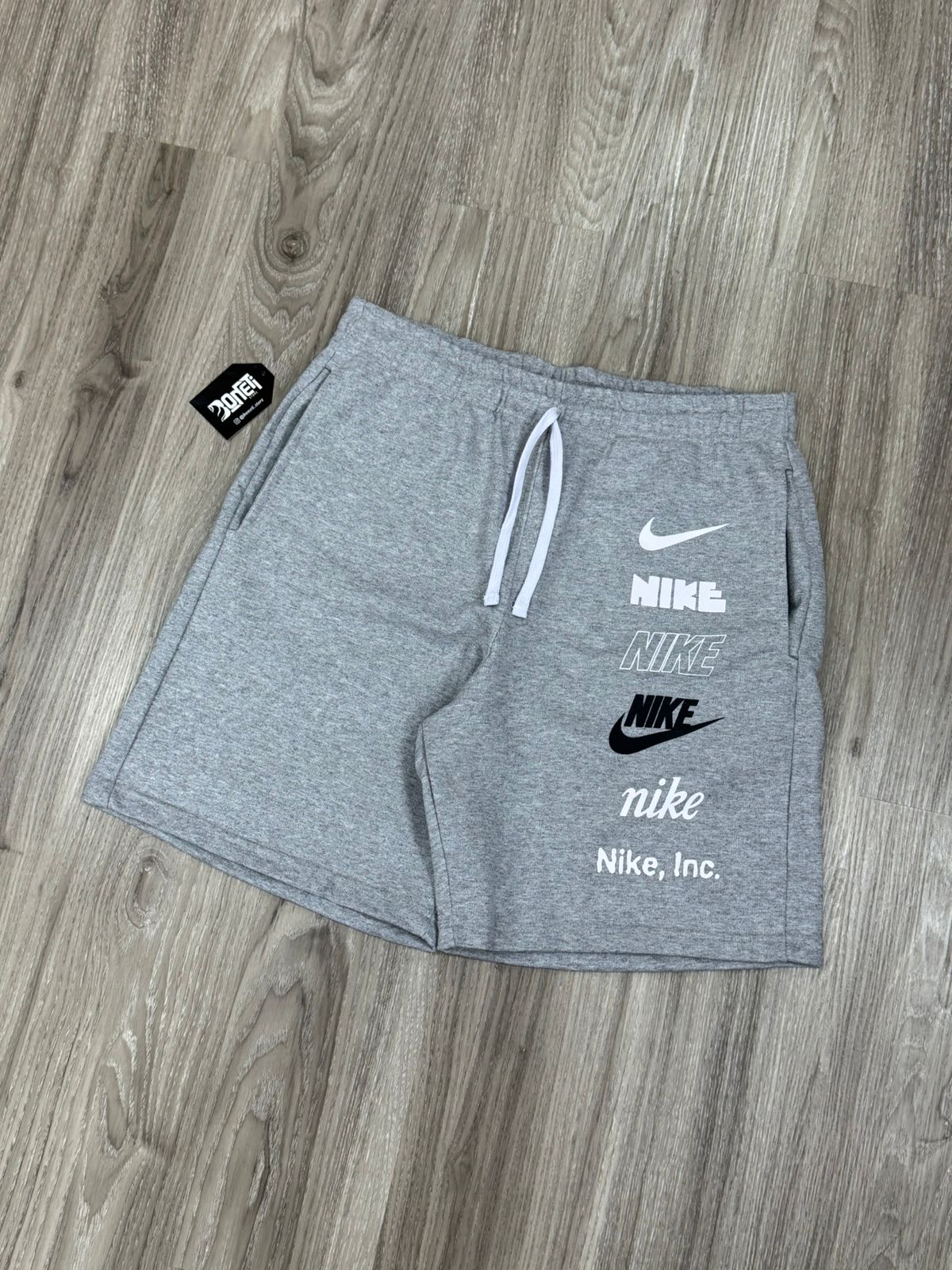 SHORTS MOLETOM NK MULTI SWOOSH - CINZA