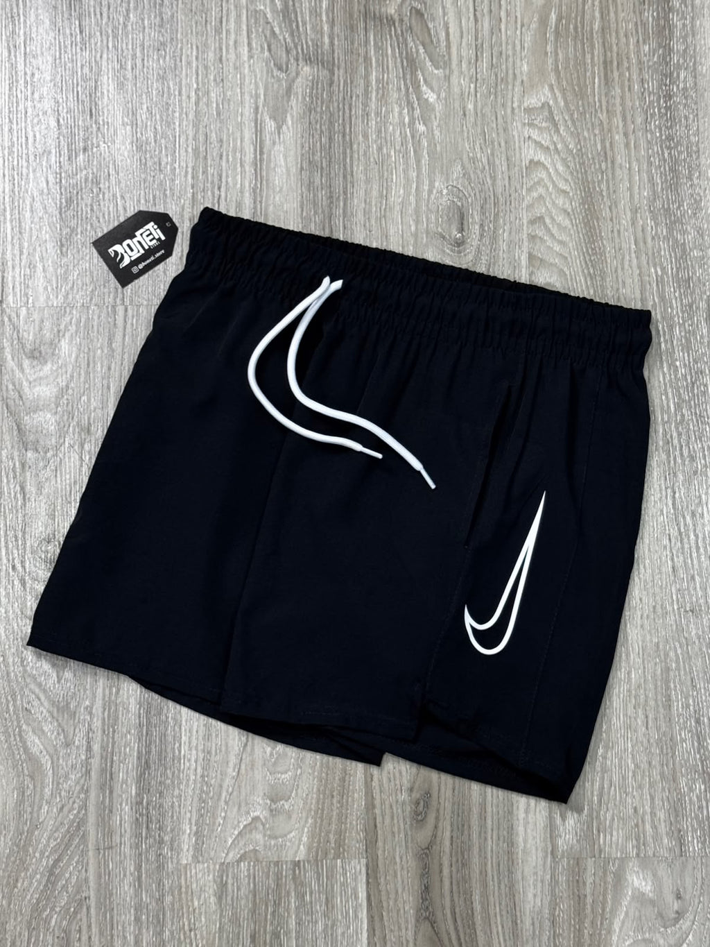 SHORTS TACTEL NK SWOOSH VAZADO VERTICAL - PRETO