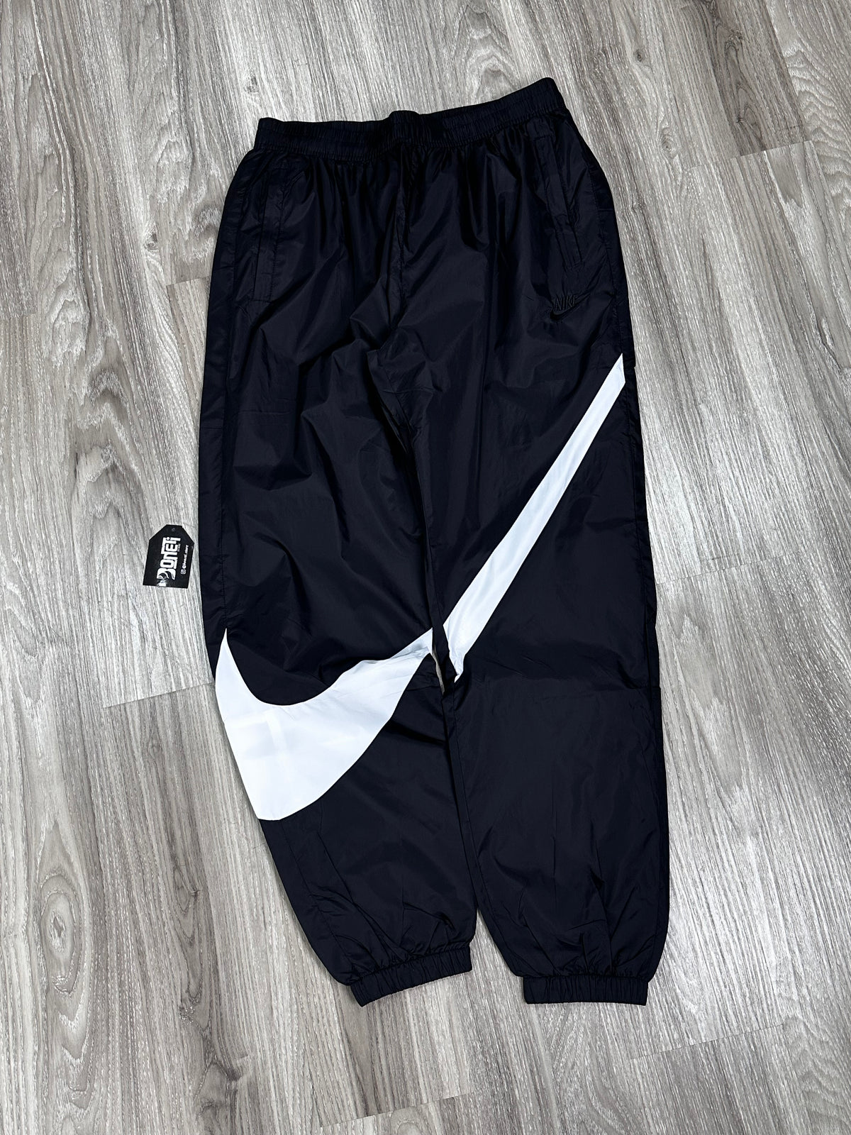 CALÇA TACTEL NK IMPERMEÁVEL BIG SWOOSH - PRETA