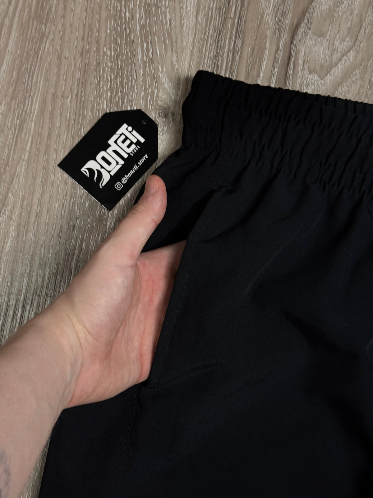 SHORTS TACTEL NK SWOOSH VAZADO VERTICAL - PRETO