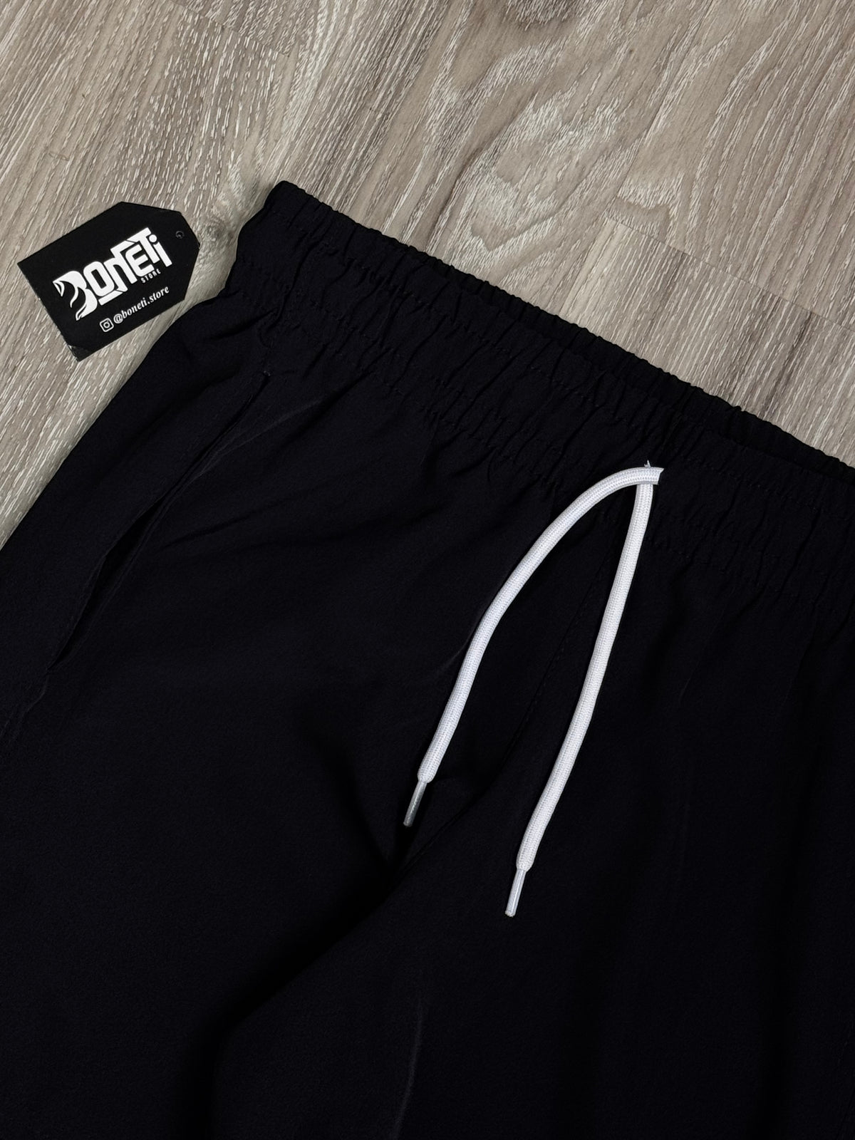 SHORTS TACTEL NK SWOOSH VAZADO VERTICAL - PRETO