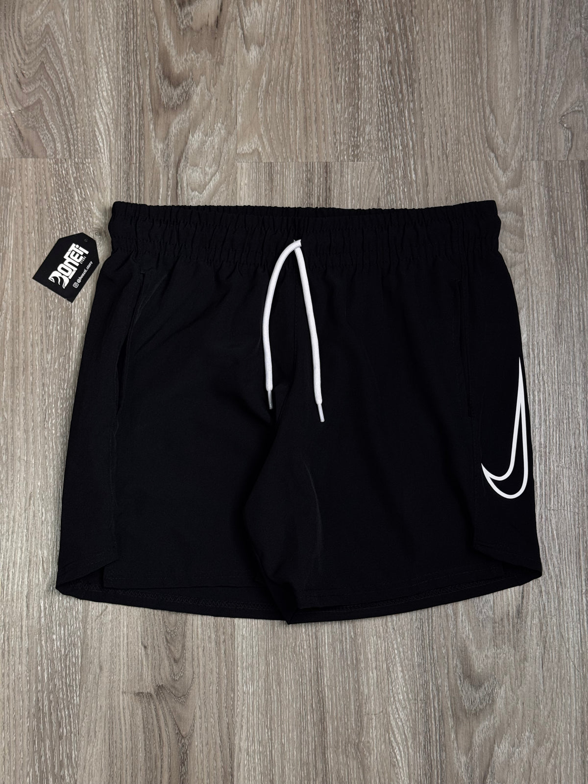 SHORTS TACTEL NK SWOOSH VAZADO VERTICAL - PRETO
