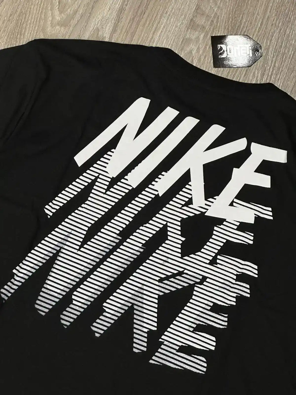 CAMISETA NK REPEAT FADE