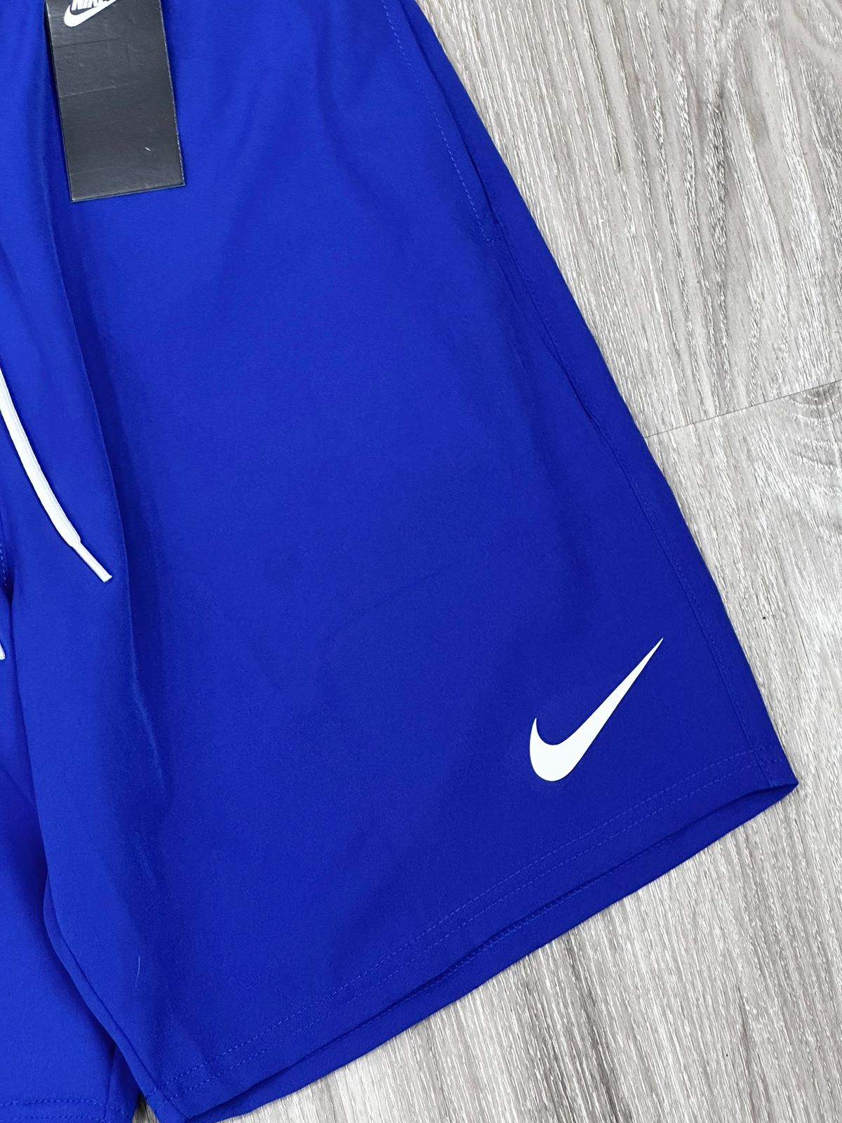 SHORTS TACTEL NK MINI SWOOSH - AZUL