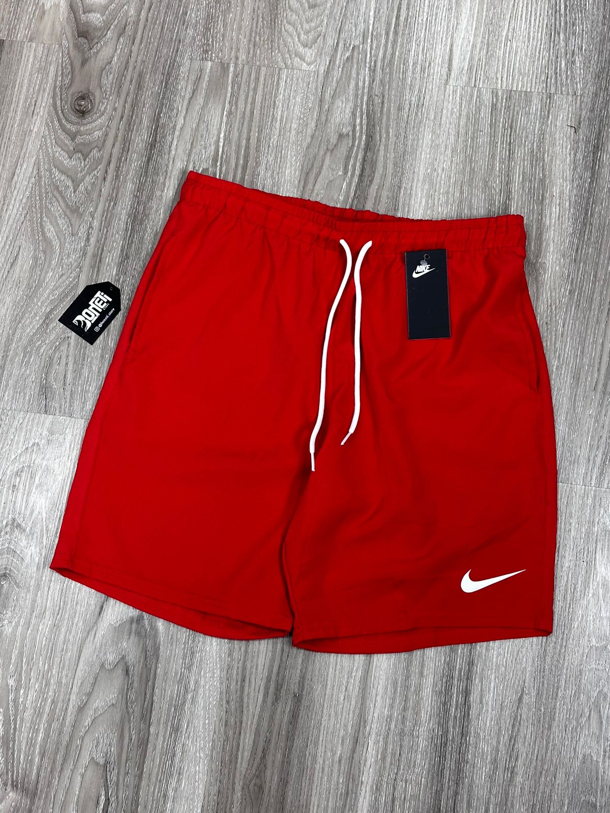 SHORTS TACTEL NK MINI SWOOSH - VERMELHO