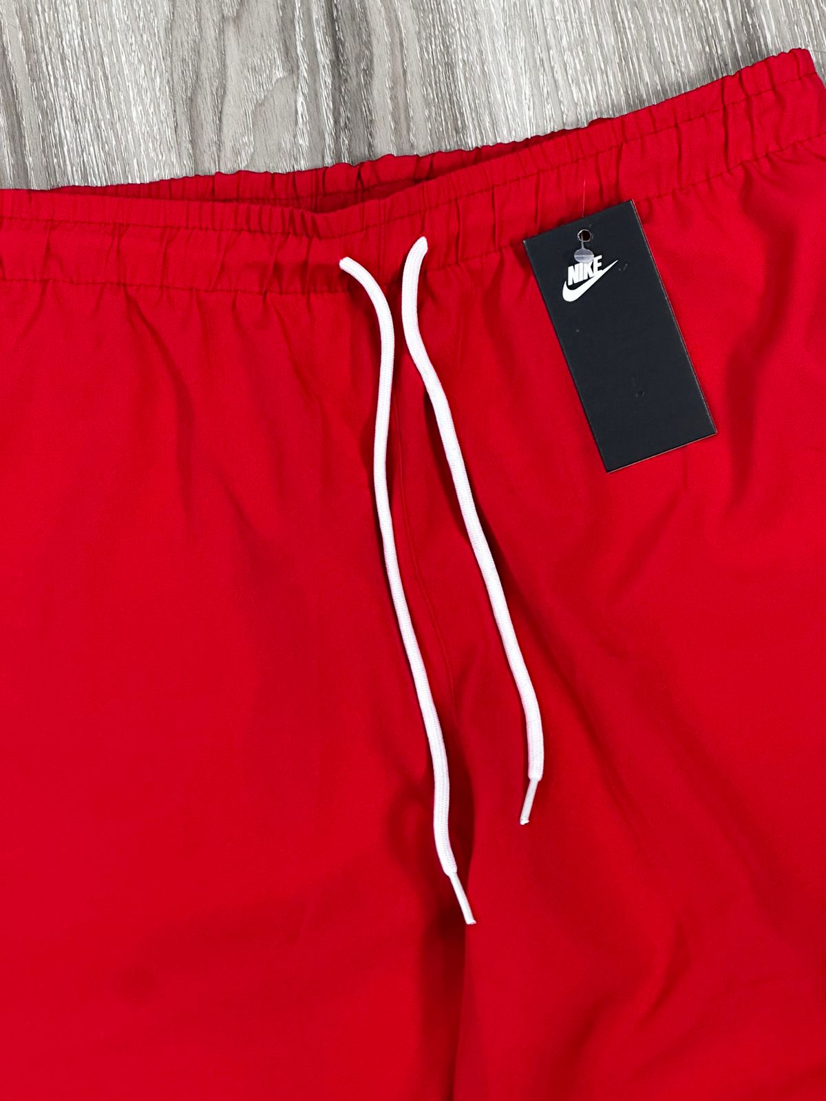 SHORTS TACTEL NK MINI SWOOSH - VERMELHO